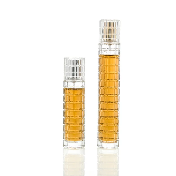 HUA0046 perfume bottle, tall slender cylindrical column glass bottle with clear finish and stacked grid-like textured ridges, featuring a gold collar neck accent and a matching tall transparent cylindrical plastic cap with a high-gloss shiny finish, modern geometric fragrance packaging design available in 30ml and 50ml