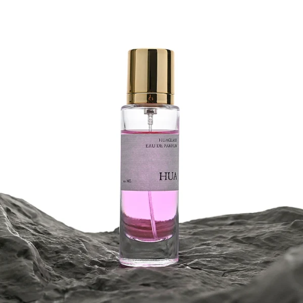HUA0056 perfume bottle, heavy-base tall slender cylindrical round glass bottle with clear finish, featuring a wide wrapped paper label, a matching neck, and a tall cylindrical plastic cap with a smooth high-gloss shiny finish, elegant modern fragrance packaging design available in 30ml, 50ml, and 100ml