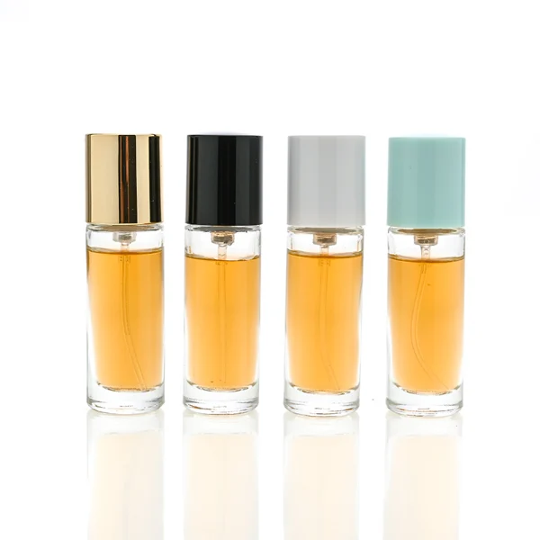 HUA0029 perfume bottle, slim cylindrical round clear glass purse-spray bottle featuring a tall cylindrical plastic cap with a smooth high-gloss shiny finish, elegant compact modern fragrance packaging design available in 10ml, 15ml, 20ml, and 30ml