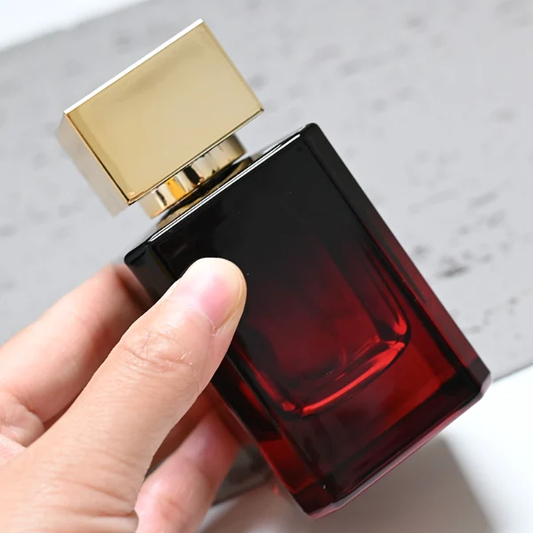 HUA0051 perfume bottle, heavy-base rectangular cuboid glass bottle with clear finish, featuring a square paper label, a black collar neck accent, and a short rectangular block-shaped solid black plastic cap with a smooth high-gloss shiny finish, elegant modern fragrance packaging design available in 30ml, 50ml, and 100ml