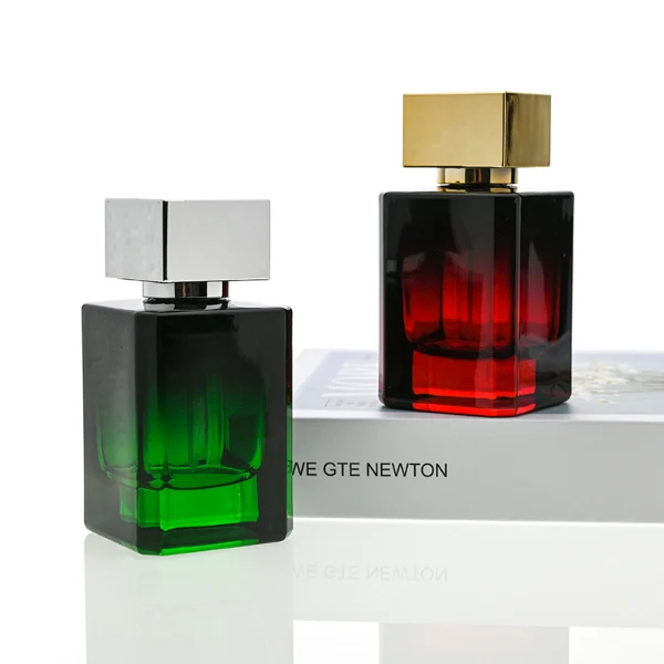 HUA0051 perfume bottle, heavy-base rectangular cuboid glass bottle with clear finish, featuring a square paper label, a black collar neck accent, and a short rectangular block-shaped solid black plastic cap with a smooth high-gloss shiny finish, elegant modern fragrance packaging design available in 30ml, 50ml, and 100ml