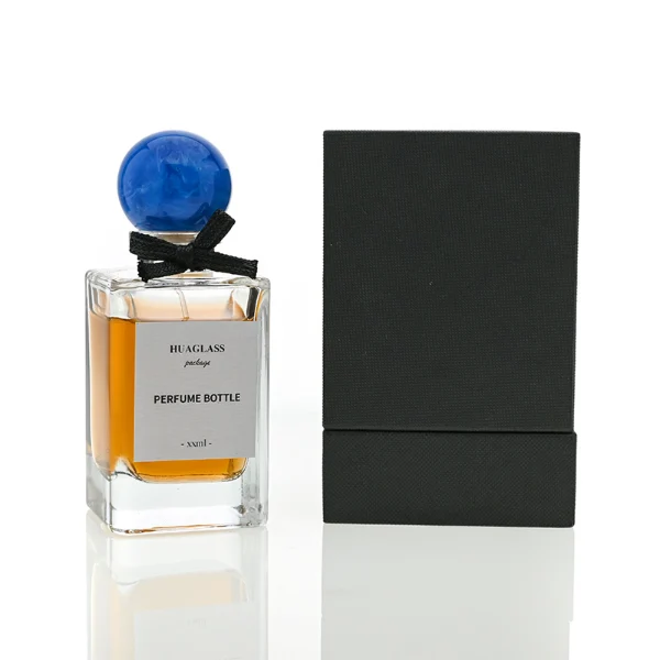 HUA0070 perfume bottles, rectangular clear glass with round colorful resin caps and metallic collars, pink and purple liquids, modern elegant design, 30ml 50ml 100ml.