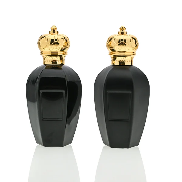 HUA0071 perfume bottle, black curved glass with gold crown-shaped zinc-aluminum alloy cap, rectangular front panel, luxurious classic design, available in 30 ml, 50 ml, and 100 ml