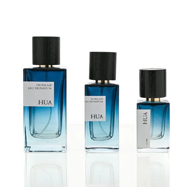 HUA0073 perfume bottle, rectangular colored glass with liquid, black wooden ring-shaped cap, modern luxurious design, available in 30 ml, 50 ml, and 100 ml