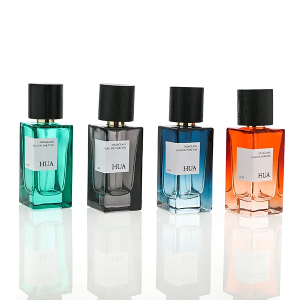 HUA0073 perfume bottle, rectangular colored glass with liquid, black wooden ring-shaped cap, modern luxurious design, available in 30 ml, 50 ml, and 100 ml