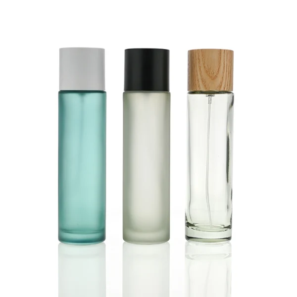 HUA0074 perfume bottle, cylindrical colored glass with liquid, colored wooden cap, modern minimalist design, available in 30 ml, 50 ml, and 100 ml