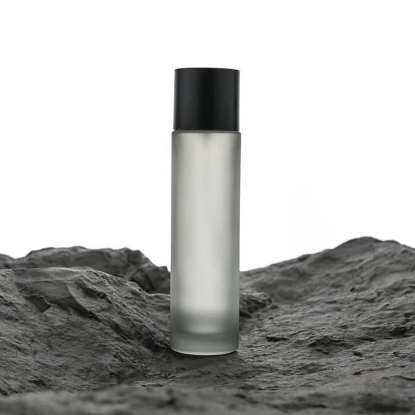 HUA0074 perfume bottle, cylindrical colored glass with liquid, colored wooden cap, modern minimalist design, available in 30 ml, 50 ml, and 100 ml