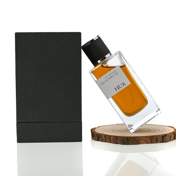 HUA0075 perfume bottle, rectangular clear glass, plastic cap with leather overlay, modern luxurious design, available in 30 ml, 50 ml, and 100 ml