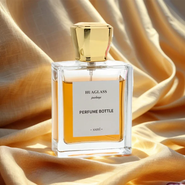 HUA0086 perfume bottle, square glass with liquid, glossy tapered plastic cap, modern elegant design, available in 30 ml, 50 ml, and 100 ml