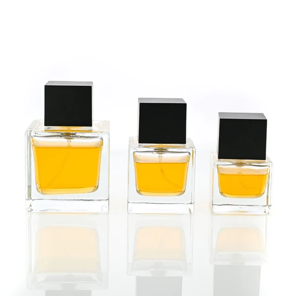 HUA0090 perfume bottle, square  glass with liquid, black wooden square cap, modern minimalist design, available in 30 ml, 50 ml, and 100 ml