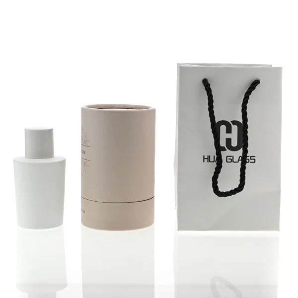 HUA0098 perfume bottle, matte plastic bottle with matching plastic cap in black and white, modern minimalist design, available in 50 ml and 75 ml