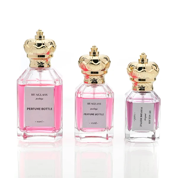 HUA0099 perfume bottle, faceted clear glass with liquid, glossy crown-shaped plastic cap, modern elegant design, available in 50 ml and 75 ml