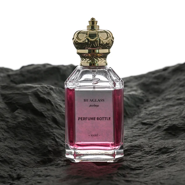 HUA0099 perfume bottle, faceted clear glass with liquid, glossy crown-shaped plastic cap, modern elegant design, available in 50 ml and 75 ml
