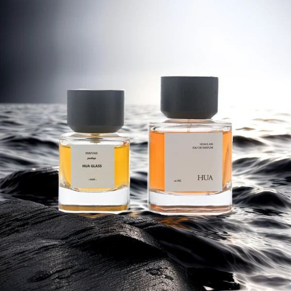 HUA0112 perfume bottle, cylindrical internally sprayed glass with liquid and outer label, wide black wooden cap, modern minimalist design, available in 30 ml, 50 ml, and 100 ml