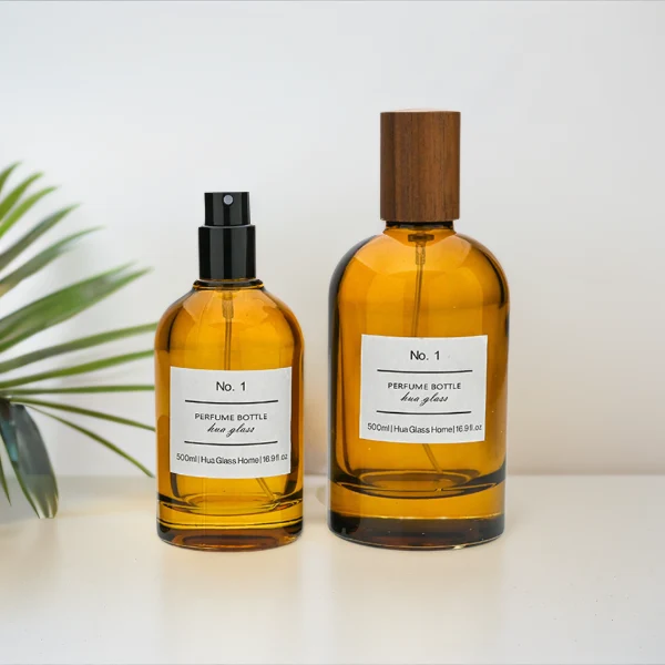 HUA0120 perfume bottle, amber cylindrical glass with outer label, tall wooden cylindrical cap, minimalist contemporary design, available in 30 ml, 50 ml, and 100 ml