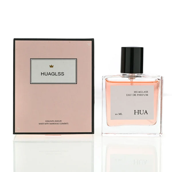 HUA0121 perfume bottle, square clear glass with outer label, aluminum cylindrical cap in black and gold finishes, modern minimalist luxury design, available in 30 ml, 50 ml, and 100 ml