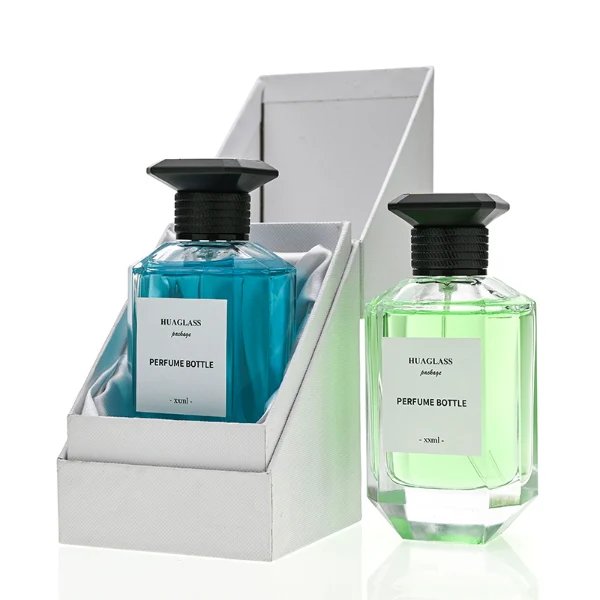 HUA0126 perfume bottle, faceted rectangular clear glass body with liquid, square resin cap, printed logo, contemporary elegant design, available in red, green, yellow, ideal for gifting and daily use.