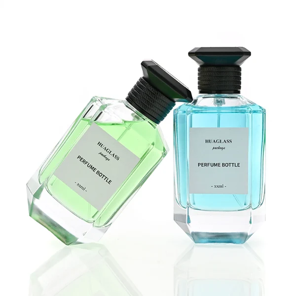 HUA0126 perfume bottle, faceted rectangular clear glass body with liquid, square resin cap, printed logo, contemporary elegant design, available in red, green, yellow, ideal for gifting and daily use.