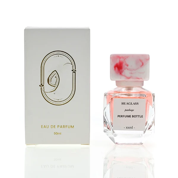 HUA0126 perfume bottle, faceted rectangular clear glass body with liquid, square resin cap, printed logo, contemporary elegant design, available in red, green, yellow, ideal for gifting and daily use.
