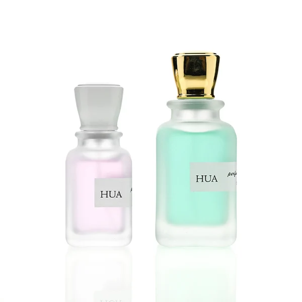 HUA0143 perfume bottle, opaque rectangular glass body with 30 ml, 50 ml, or 100 ml liquid, square plastic cap, outer label with printed logo, modern elegant design, ideal for gifting and daily use.