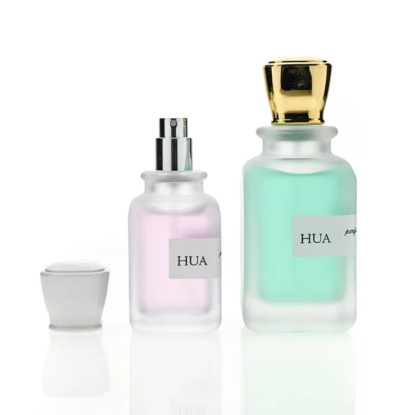 HUA0143 perfume bottle, opaque rectangular glass body with 30 ml, 50 ml, or 100 ml liquid, square plastic cap, outer label with printed logo, modern elegant design, ideal for gifting and daily use.