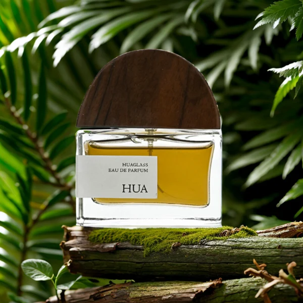HUA0144 perfume bottle, rectangular clear glass body with 30 ml, 50 ml, or 100 ml liquid, half-circle wooden cap with gold metallic neck, outer label with printed logo, modern elegant design, ideal for gifting and daily use.