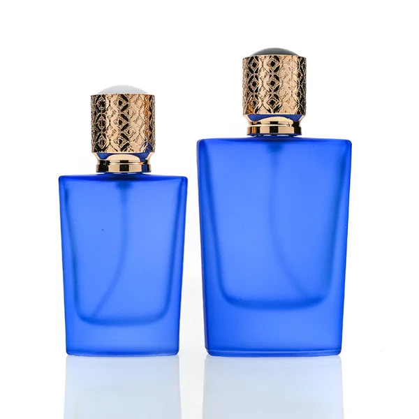 HUA0146 perfume bottle, rectangular frosted opaque glass body with 30 ml or 50 ml liquid, cylindrical plastic cap with gold carved patterns, outer label with printed logo, modern elegant design, ideal for gifting and daily use.