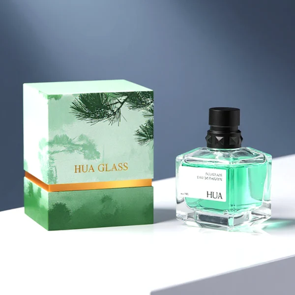 HUA0147 perfume bottle, rectangular clear glass body with 50 ml, 70 ml, or 100 ml liquid, layered ring-shaped plastic cap with diamond-textured base, outer label with printed logo, modern luxurious design, ideal for gifting and daily use.