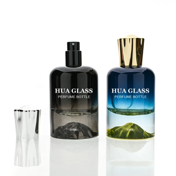 HUA0148 perfume bottle, cylindrical customizable gradient glass body with mountain-shaped base, 30 ml, 50 ml, or 100 ml liquid, irregular cylindrical cap with raised top in gold or silver, outer label with printed logo, modern elegant design, ideal for gifting and daily use.