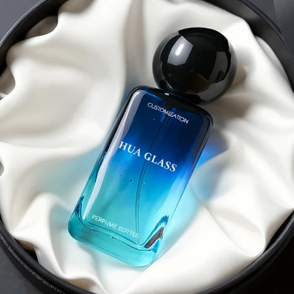 HUA0151 perfume bottle, rectangular customizable gradient glass body with 30 ml, 50 ml, or 100 ml liquid, asymmetrical rounded plastic cap, outer label with printed logo, modern elegant design, ideal for gifting and daily use.