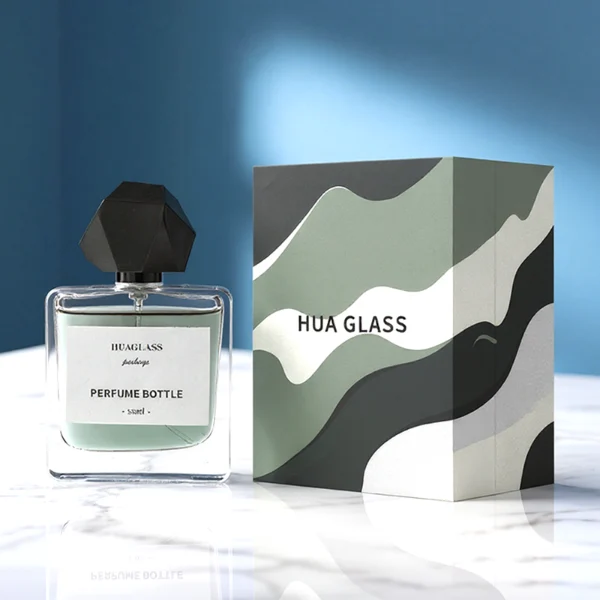 HUA0152 perfume bottle, rectangular clear glass body with 50 ml or 100 ml liquid, faceted geometric plastic cap, outer label with printed logo, modern luxurious design, ideal for gifting and daily use.