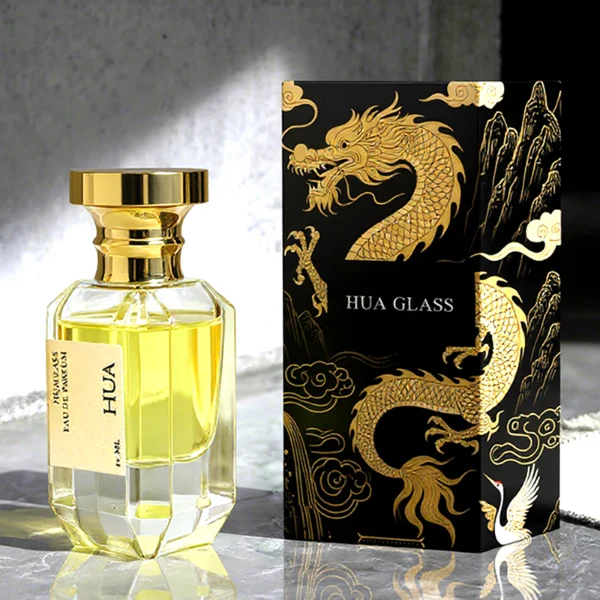 HUA0156 perfume bottle, multifaceted clear glass body with 30 ml, 50 ml, or 100 ml liquid, cylindrical cap with flat top and stepped base in gold, outer label with printed logo, modern elegant design, ideal for gifting and daily use.