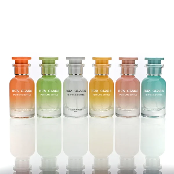 HUA0158 perfume bottle, cylindrical customizable glass body with 30 ml or 50 ml liquid, plug-shaped plastic cap with customizable color, silver ring at neck, private printed logo, modern elegant design, ideal for gifting and daily use.