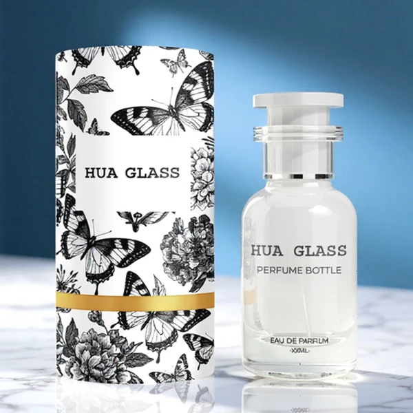 HUA0158 perfume bottle, cylindrical customizable glass body with 30 ml or 50 ml liquid, plug-shaped plastic cap with customizable color, silver ring at neck, private printed logo, modern elegant design, ideal for gifting and daily use.