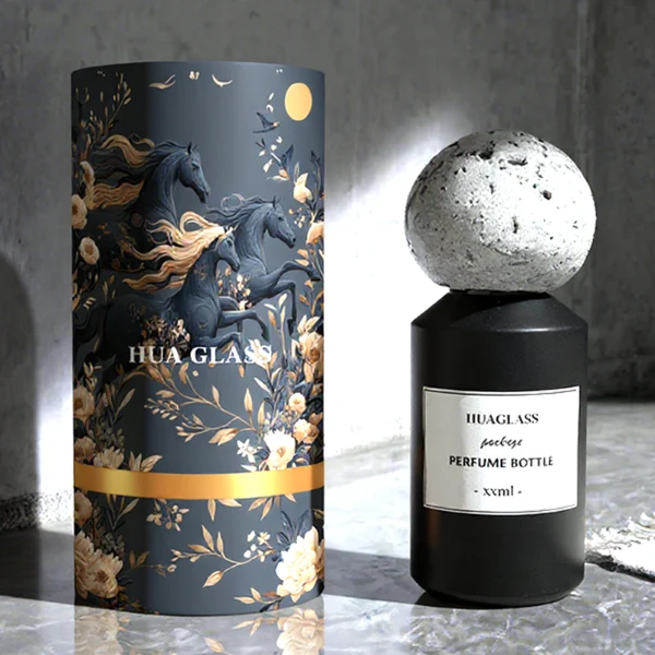 HUA0161 perfume bottle, cylindrical glass body with matte solid-color spray finish and 30 ml, 50 ml, or 100 ml liquid, spherical artificial stone cap, outer label with printed logo, modern elegant design, ideal for gifting and daily use.