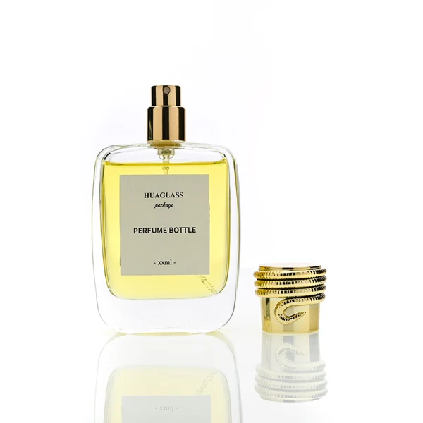 HUA0166 perfume bottle, rectangular transparent glass body with 30 ml, 50 ml, or 100 ml liquid, cylindrical plastic cap with rope-patterned detailing at the top in black or gold, outer label with printed logo, modern elegant design, ideal for gifting and daily use.