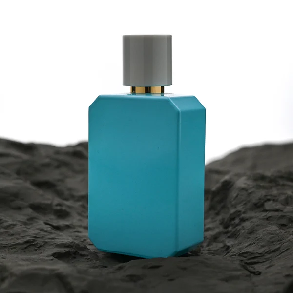 HUA0169 perfume bottle, octagonal solid-color glossy sprayed glass body with customizable color, 30 ml, 50 ml, or 100 ml liquid, cylindrical plastic cap with gold or silver neck ring, smooth glossy spray coating, modern minimalist design, ideal for gifting and daily use.