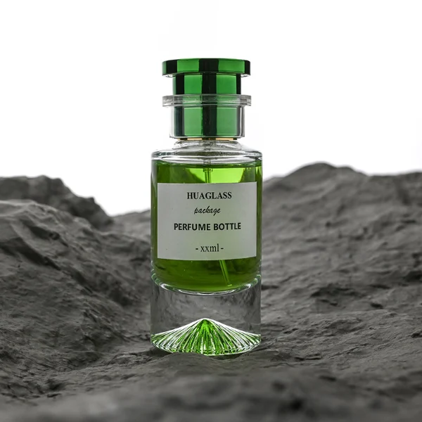 HUA0178 perfume bottle, cylindrical transparent glass body with embossed radial base pattern, 30 ml, 50 ml, or 100 ml liquid, stopper-style cylindrical plastic cap with customizable colors, printed logo label, modern luxury minimalist design, ideal for gifting and daily use.