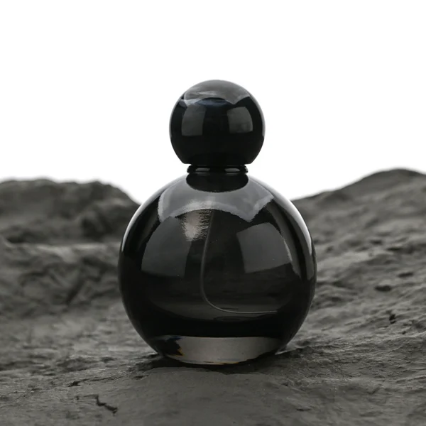 HUA0180 perfume bottle, round gourd-shaped glass body with customizable transparent colors, 30 ml, 50 ml, or 100 ml liquid, glossy spherical plastic cap with customizable colors, custom printed logo, modern playful elegant design, ideal for gifting and daily use.
