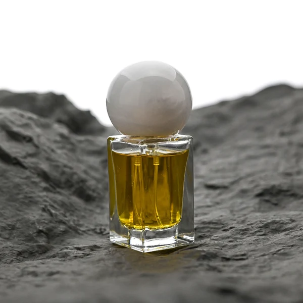 HUA0181 perfume bottle, rectangular faceted transparent glass body with 15 ml, 30 ml, 50 ml, or 100 ml liquid, glossy spherical resin cap with marble-inspired texture and customizable colors, printed logo label, modern artistic luxury design, ideal for gifting and daily use.