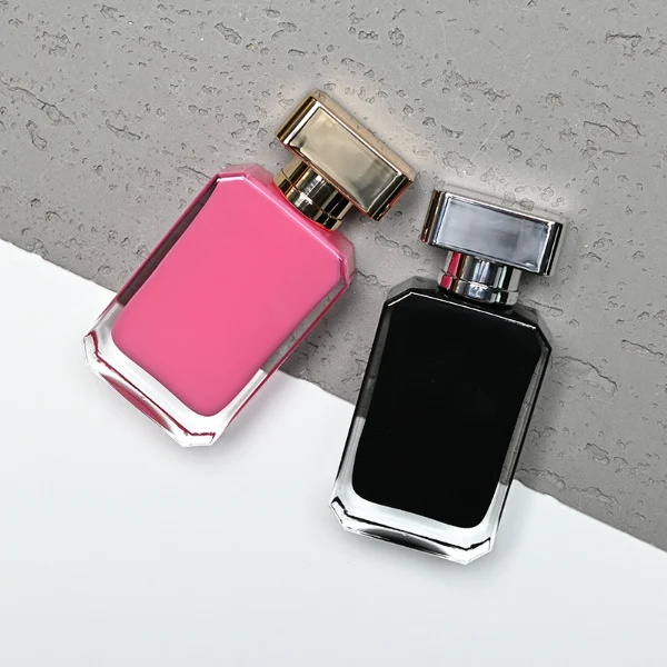 HUA0188 perfume bottle, rectangular inner-printed glass body with beveled edges, 30 ml, 50 ml, or 100 ml liquid, rectangular glossy plastic cap with gold or silver neck and customizable colors, printed logo with private imprint, modern minimalist luxury design, ideal for gifting and daily use.