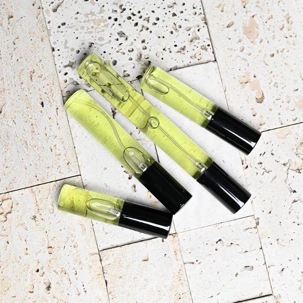HUA0196 perfume bottle, slim cylindrical transparent glass body with private printed logo, 5 ml, 8 ml, 10 ml, or 15 ml liquid, aluminum spray cap, compact and practical design, ideal for travel and sample use.