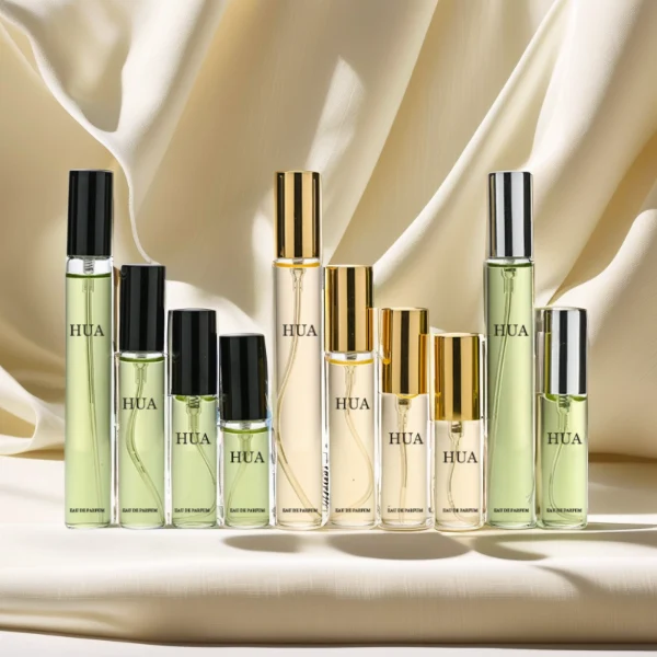 HUA0196 perfume bottle, slim cylindrical transparent glass body with private printed logo, 5 ml, 8 ml, 10 ml, or 15 ml liquid, aluminum spray cap, compact and practical design, ideal for travel and sample use.