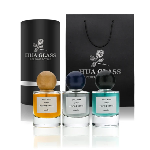 HUA0200 perfume bottle, cylindrical matte solid-color sprayed glass body with 30 ml, 50 ml, or 100 ml liquid, spherical resin cap with marble pattern, private printed logo, modern luxurious design, ideal for gifting and daily use.
