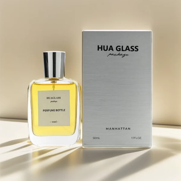 HUA0202 perfume bottle, rectangular transparent glass body with 50 ml or 100 ml liquid, stepped cylindrical plastic cap in black, gold, or silver, brand label applied on the surface, modern minimalist design, ideal for gifting and daily use.
