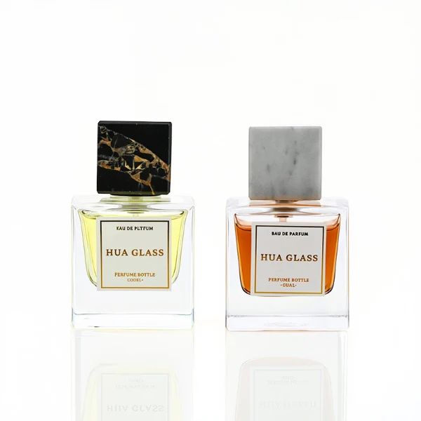 HUA0226 perfume bottle, square transparent glass body with thick base, 30 ml, 50 ml, or 100 ml liquid, square natural stone cap with customizable color and organic stone texture, brand label applied on bottle, modern luxurious fashion design, ideal for gifting and daily use.