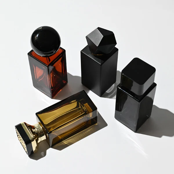 HUA0227 perfume bottle collection, rectangular glass bottles with customizable transparent, colored, or gradient finish, 30 ml, 50 ml, or 100 ml liquid, four distinct plastic cap styles including geometric, square cylindrical, rounded, and metallic square designs, modern luxurious fashion style, ideal for gifting and daily use.