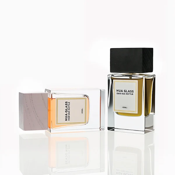 HUA0233 perfume bottle, square transparent glass body with thick base, 50 ml liquid, square wooden cap with natural wood texture, brand label applied on bottle, modern luxurious design, ideal for gifting and daily use.
