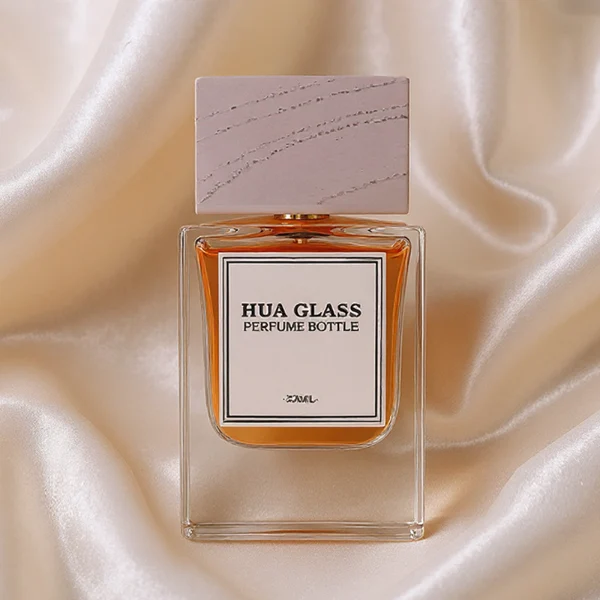 HUA0233 perfume bottle, square transparent glass body with thick base, 50 ml liquid, square wooden cap with natural wood texture, brand label applied on bottle, modern luxurious design, ideal for gifting and daily use.