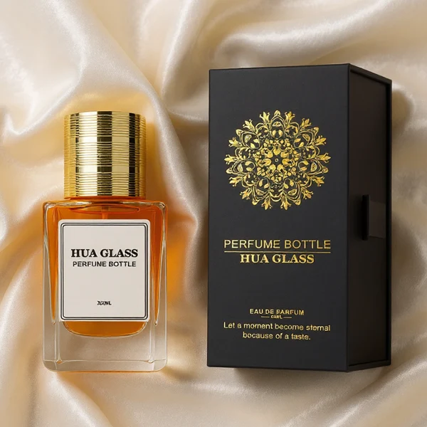 HUA0235 perfume bottle, square transparent glass body with thick base, 30 ml, 50 ml, or 100 ml liquid, cylindrical plastic cap with side threading and metallic finish in gold, black, or silver, brand label applied on bottle, modern luxurious design, ideal for gifting and daily use.